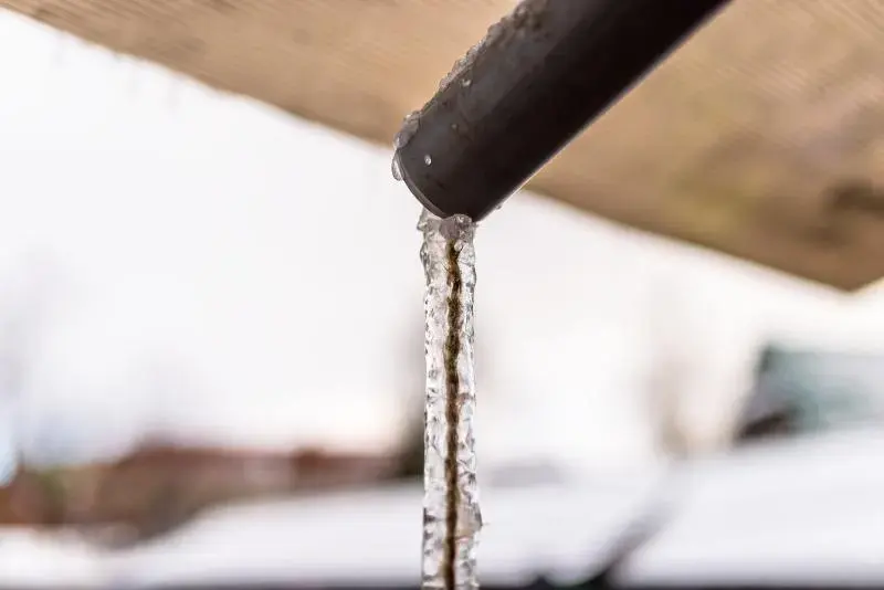 Ice hanging from a frozen pipe after a Shelby County ice storm